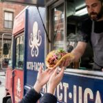Food truck owner planning business operations and menu strategy