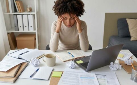 Professional using time blocking calendar for creative work