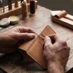 Entrepreneur creating handmade crafts in a home workshop